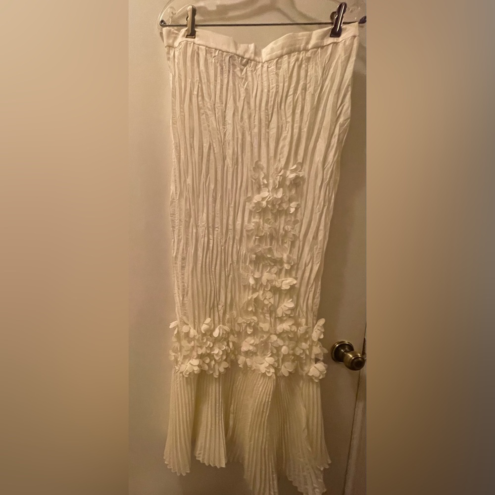 Dinna Vinci pleated skirt with cascading floral front.